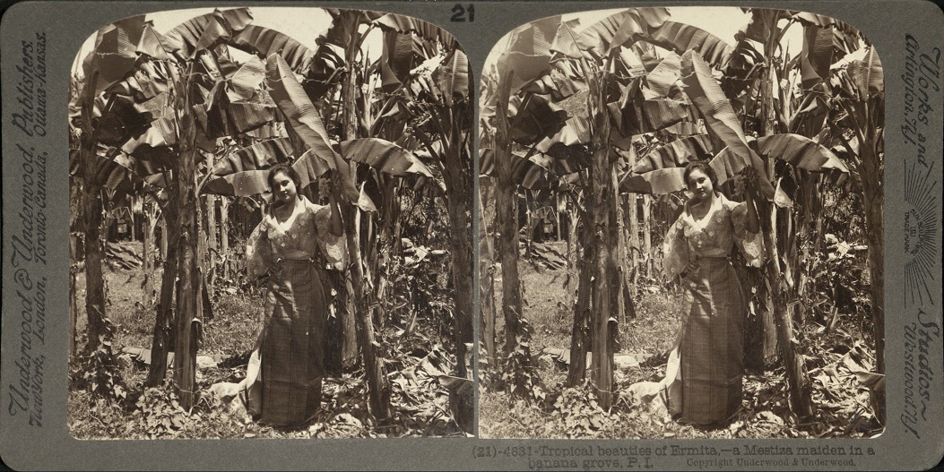 Tropical beauties of Ermita – a Mestiza maiden in a banana grove, P. I.